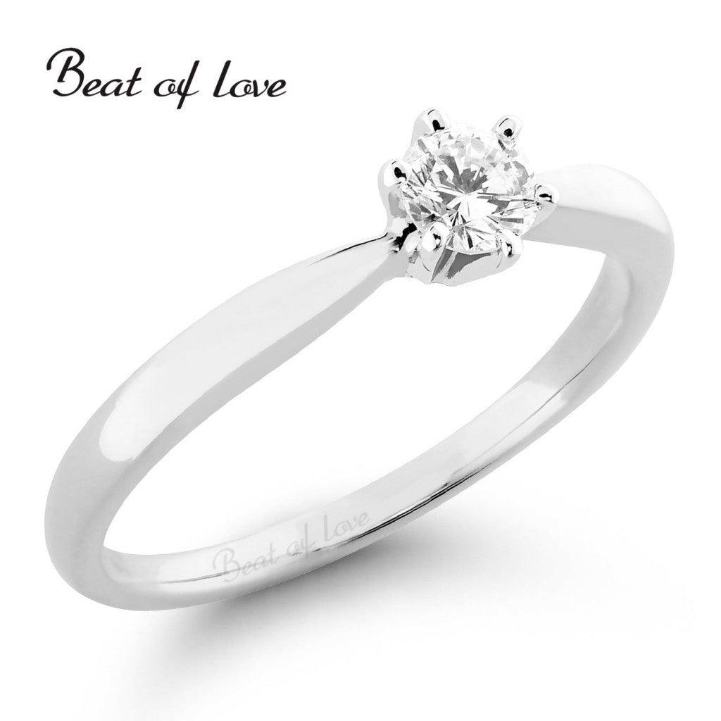 Beat of Love - valkokultainen timanttisormus R-29990DW - Puustjärven Kello & Kulta